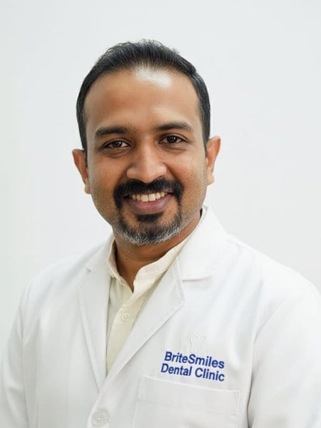 Dr. Tivin Thomas